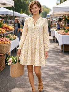 Golden Bloom Tiered Floral Mini Dress - Soft Feminine Yellow Print Flowy Silhouette Lightweight Woven Fabric Casual Fit Long Sleeves Perfect for Brunch Markets Vacations