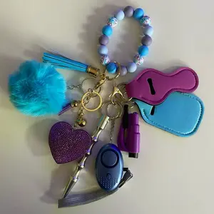 8 Piece Keychain Accessory Set with Beaded Bracelet Heart Charm Fuzzy Pom Pom and Colorful Tassels