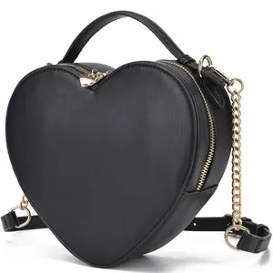 Purse heart shape crossbody Purse heart shape crossbody