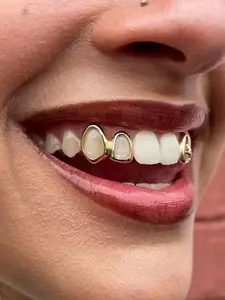 A gold/silver hip-hop punk fashionable, personalized, and minimalist dental accessory suitable for daily holiday and party fashion outfits