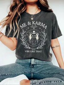 "I vibe with karma" Mysterious Black Cat T-shirt, Women, Lady, Fitted, featuring a retro distressed texture, a black cat celestial-themed print, a moon and branch print pattern, and the fun slogan "ME & KARMA VIBE LIKE THAT"