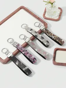 This wristband keychain is adorned with sparkling diamonds and comes with a wrist strap, making it an ideal accessory for girls and women, usable as a car key wristband, phone, wallet, or camera key ring, Keychain for Bags