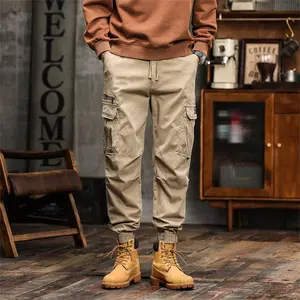 Men's solid color fashionable casual slightly stretch fabric with design, large pocket design with adjustable elastic drawstring design, suitable for outdoor hiking, sports cuff work trousers cargos Menswear pants Stylish Cuffed Light cargopantsmen Plain