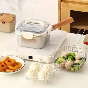 A stainless steel fryer set - portable frying pot with frying basket, lid, tongs, strainer, and detachable handle, suitable for frying chicken, French fries, or noodles B22
