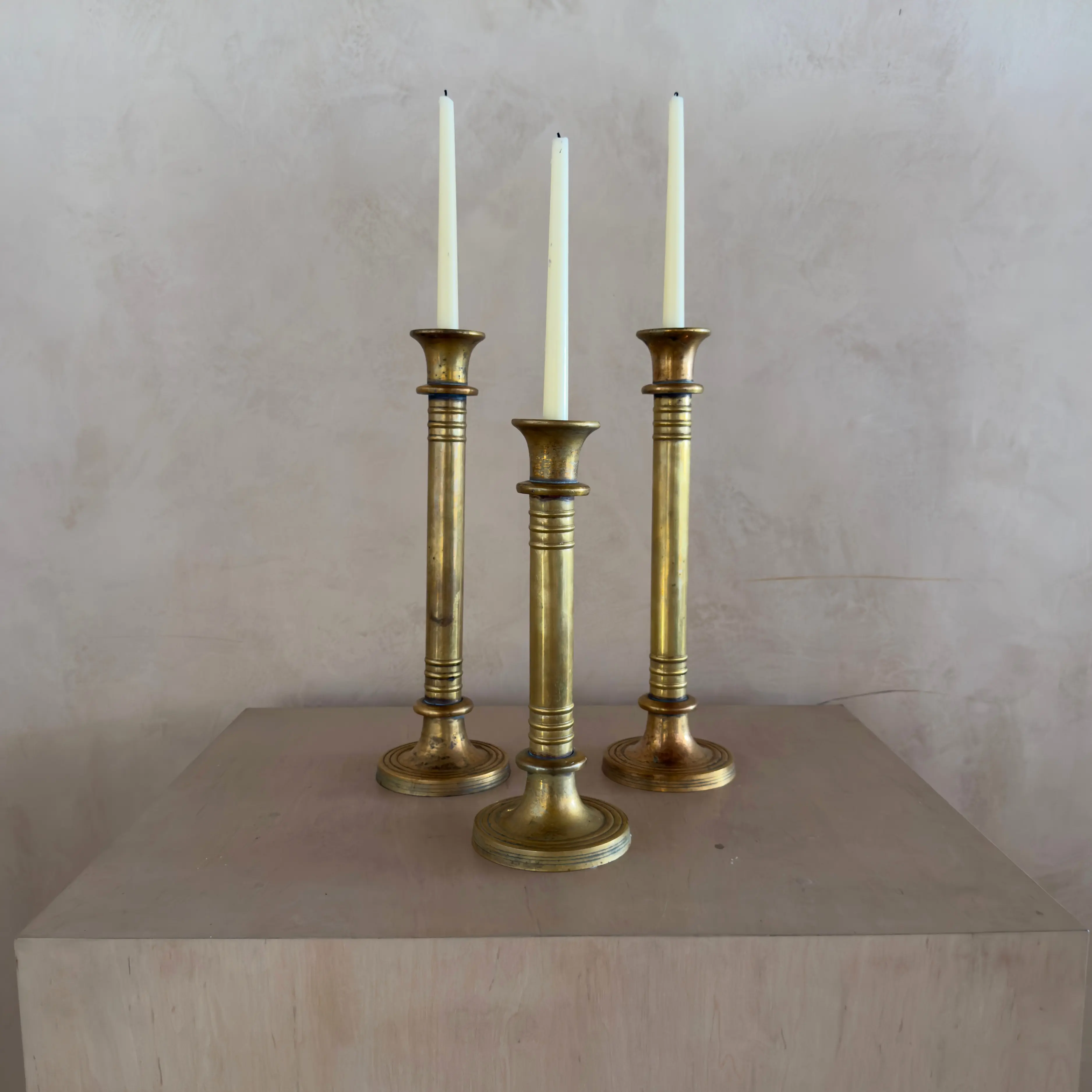 Trio of Large Ringed Brass Candlesticks