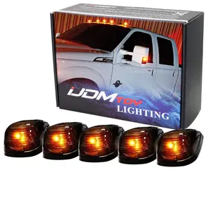 Truck SUV 4x4, Black-Out Smoked Lens Amber LED Illuminated Cab Roof Clearance Marker Lamps 5-Piece Roof Running Light Set Powered by (5) 5050-SMD LED Bulbs