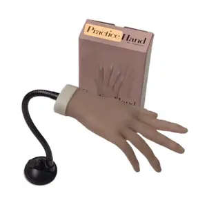 Training Practice Hand, with Adjustable Bracket Realistic Silicone Hand Mannequin + practice tips.  Ideal for practicing nail art, acrylics, and manicure techniques, it serves as an invaluable tool for enhancing your nail art skills.  Made from silicone.