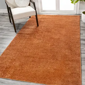 JONATHAN Y Haze Solid Low-Pile Indoor Orange Area Rug; for Living Room, Kitchen, Bedroom, Dining Room, Office