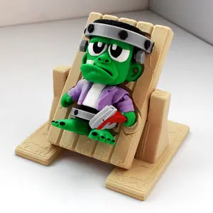A 3D-printed electric chair featuring a green-headed creature—perfect as a gift, home decor, office desk ornament, Decorative figurine. Collect this fantastical creature—an ideal gift for birthdays, holidays.