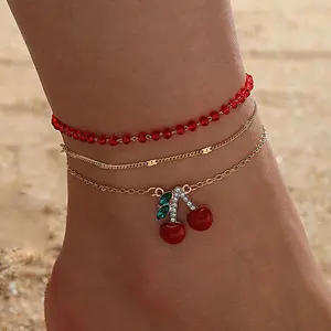 3-Piece European-American Red Rice Bead Multi-Layer Anklet Set, Alloy Chain Costume Jewelry with Rhinestone Gems, Ethnic Look Beach Accessory with Cherry Accents