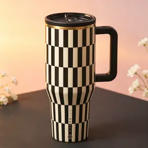 Hydrojug - A flip-top large-capacity water bottle with black and white striped handle.