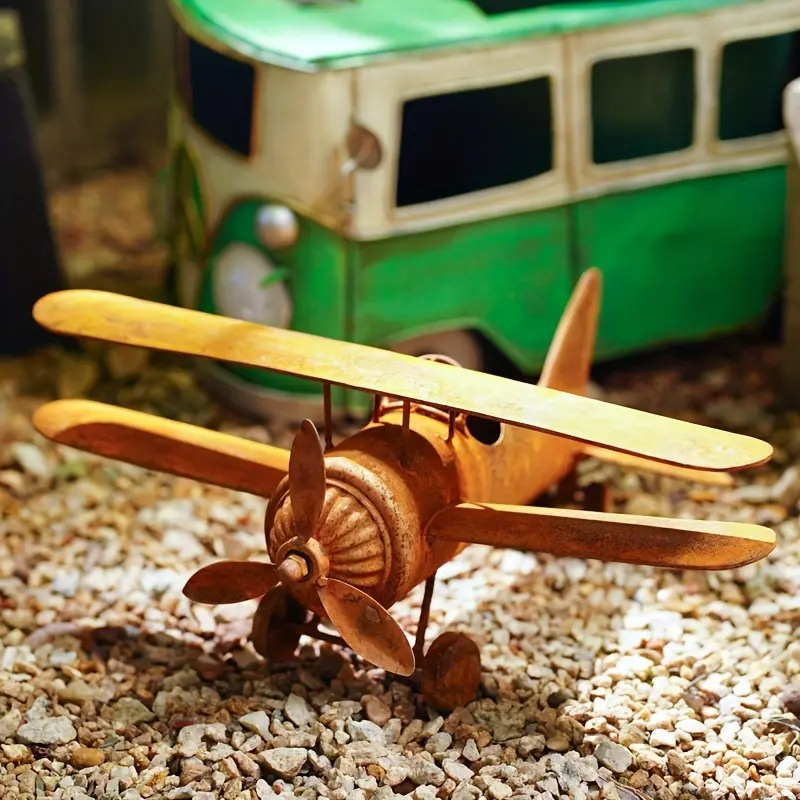 A Rusty Airplane Statue, A Metal Model of A Biplane Sculpture, A Rustic Hanging Airplane Yard Decoration, Suitable for Embellishing Gardens, Balconies, Front Doors, Entrances, and Courtyards, and Home Decor Photo Props