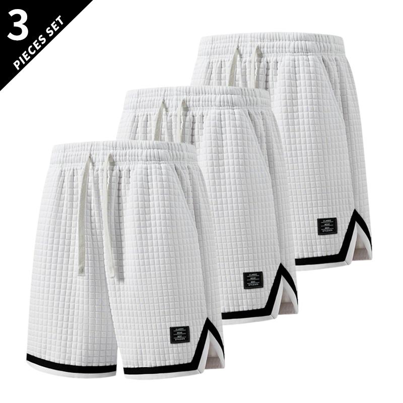 3-pack men’s breathable waffle basketball shorts with an elastic drawstring waist, side pockets, contrast piping, and a split hem—ideal for the gym, running, training, and everyday wear.