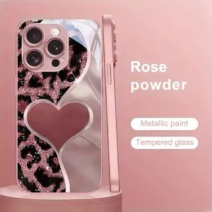 Fashion Pink Leopard Heart Pattern New Metal Paint Tempered Glass Phone Case, Suitable for iPhone 17/17 Air/17 Pro/17 Pro Max/16/16 Plus/16 Pro/16 Pro Max/15/15 Plus/15 Pro/15 Pro Max/14/14 Plus/14 Pro/14 Pro Max/13/13 Pro/13 Pro Max/12/12 Pro/12 Pro Max/
