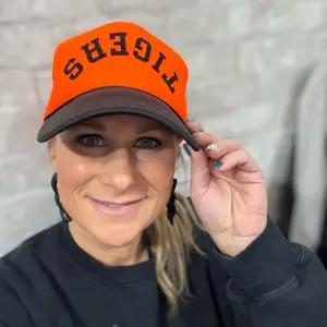 Upside Down Mascot Adjustable Trucker Hat - Orange with Black Lettering, Perfect for Fans and Supporters
