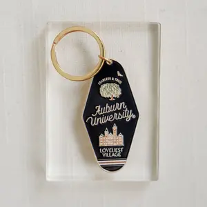Enamel Navy and Orange Keychain - Classic Design with Logo Emblem, Ideal for Gifting and Personal Use