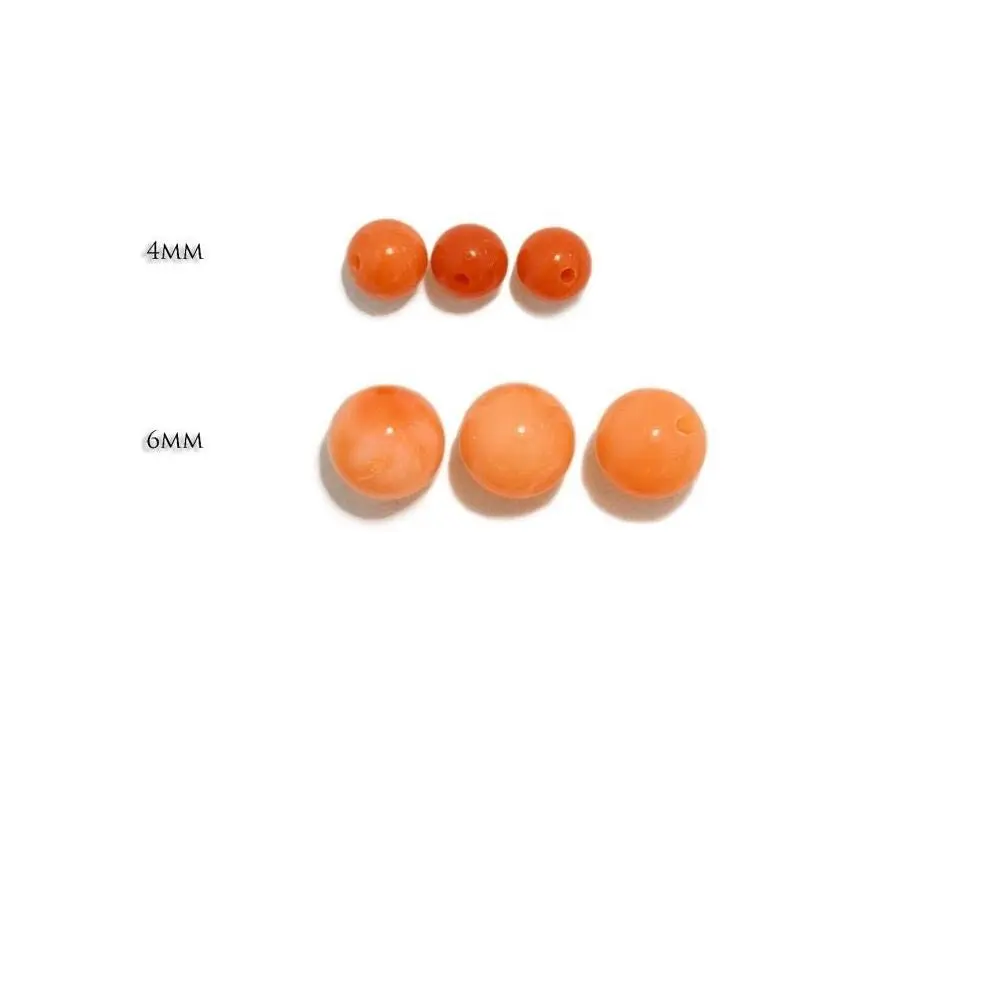Natural coral half-drilled beads in 4 and 6mm.