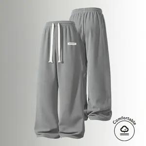 Men’s American vintage corduroy straight-leg pants—trendy, versatile brown casual long trousers with a drawstring waist and loose fit; simple, stylish men’s bottoms suitable for everyday wear and sports.