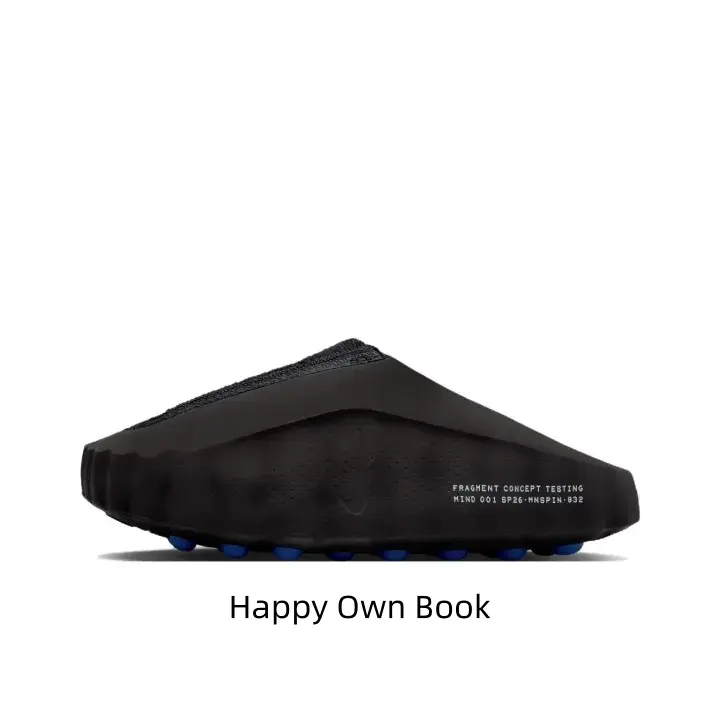 Dark matte black two-tone slide clogs, rugged molded foam construction, vivid blue massage dot inner sole low-key striking accents match dark casual, athletic & minimalist streetwear fits