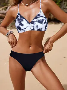 Women’s tie-dye bikini set, two-piece swimsuit featuring crisscross lace-up straps, a V-neck wrap top with an attractive back design, solid-color slimming swim bottoms; beachwear suitable for summer vacations, village trips, and pool parties.