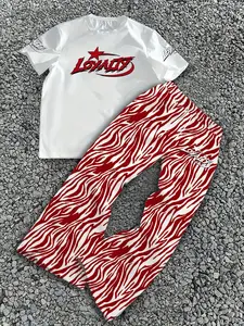 Men's red and black “LOYALTY” lettering and star print + red and white zebra-print pants, retro athletic style with drawstring waist, loose straight-leg fit