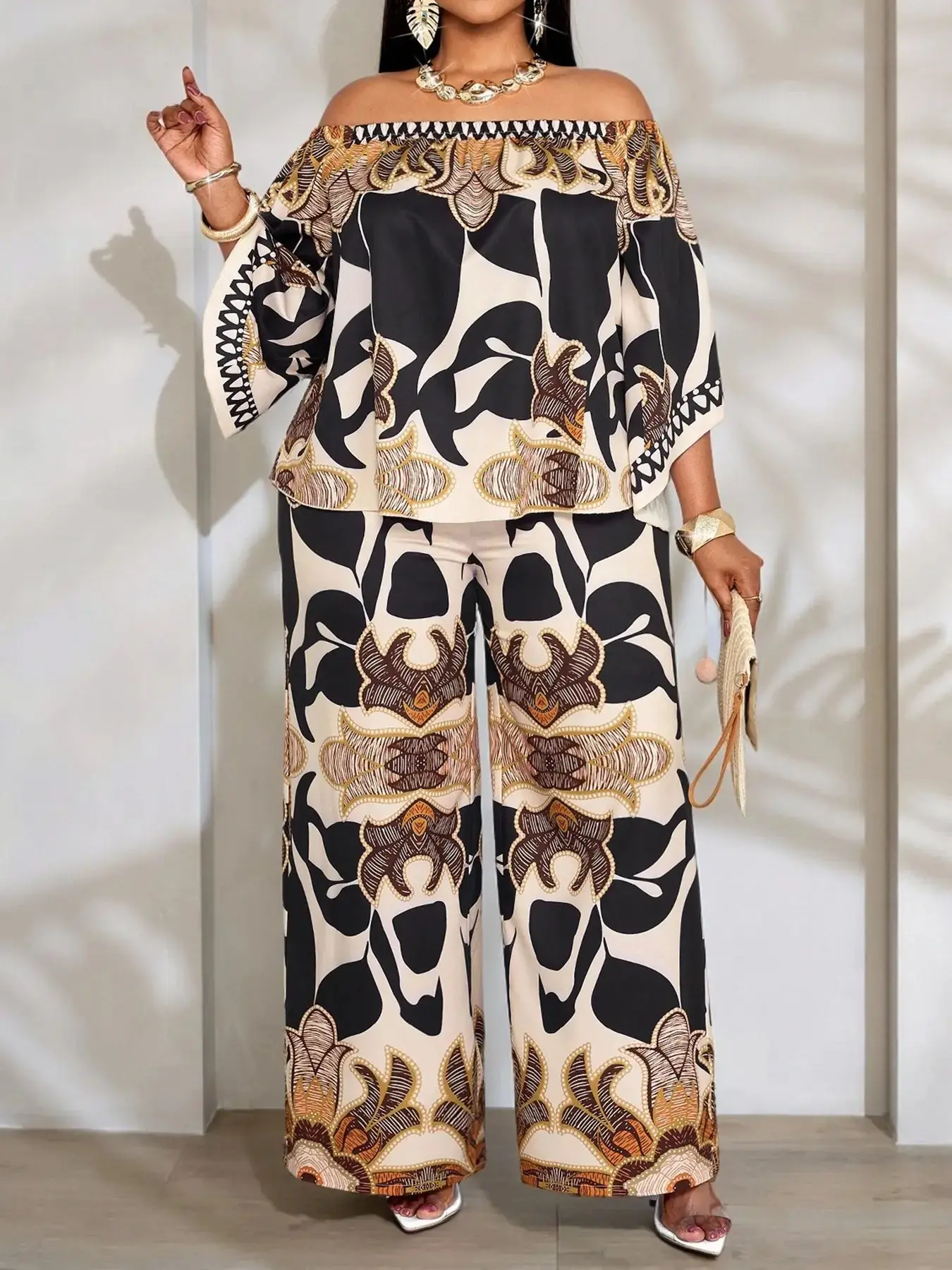 Summer Casual Fashion Plus-Size Women's Printed Pant Set: Two-Piece Outfit featuring an Off-Shoulder Batwing-Sleeve Top and High-Waisted Wide-Leg Trousers - Stylish Plus-Size Summer Apparel