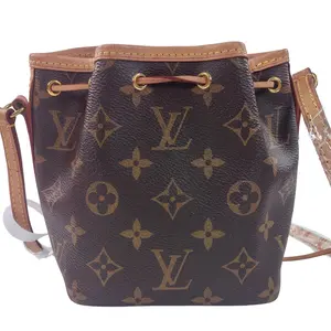 Pre-owned Louis Vuitton leather Crossbody Bags mini monogram canvas drawstring bucket crossbody bag. qg571