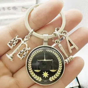 A Stylish Metal Keychain Featuring a Justice Emblem - an Ideal Present for Graduates of Law School, Judges, And Those in The Legal Field link chain ring