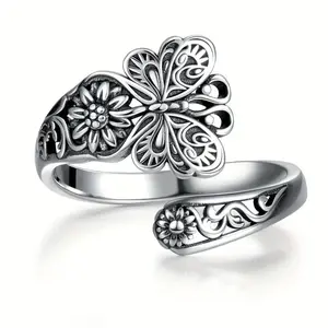 Bohemian style ring: Adjustable butterfly-shaped embossed  with a female opening open ring