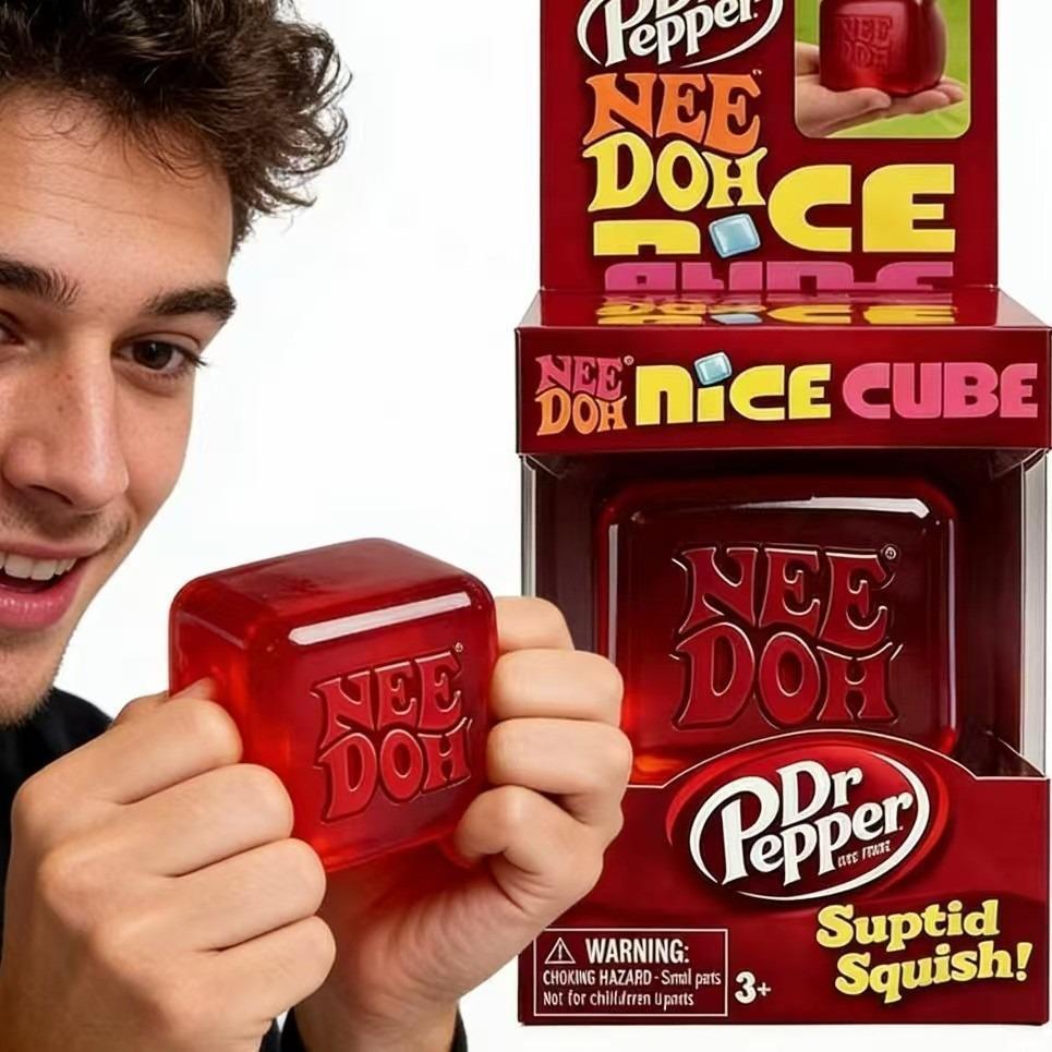 A Taste of Calm, Inspired by Dr Pepper. The 2026 Needoh Nice Cube Water Drop in iconic red is a must-have for collectors and fidget fans alike. Soft, stylish, and endlessly squeezable.