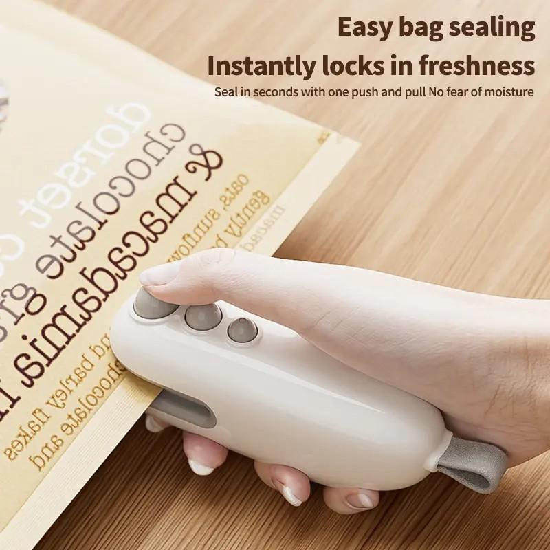 Mini snack bag sealing machine,Portable mini plastic bag sealer 2 in 1, plastic material, rechargeable, suitable for sealing and sealing snacks, coffee and pet food packaging Kitchen Preservation,Gift for Christmas New Year Mini snack bag sealing machine,Portable mini plastic bag sealer 2 in 1, plastic material, rechargeable, suitable for sealing and sealing snacks, coffee and pet food packaging Kitchen Preservation,Gift for Christmas New Year