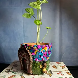 8. Handcrafted 4in Terracotta pot for home garden. A magical fairy planter for a house plant.