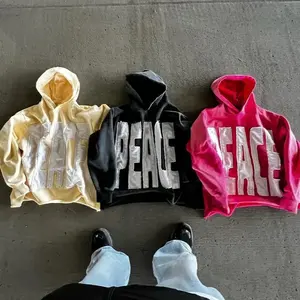 Retro washed light pink hoodie featuring prominent “PEACE” 3D letter design, loose fit, gothic and urban street style—unisex streetwear music festival look