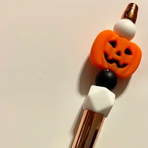 Metallic Orange Pen with Jack o Lantern