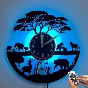 Colorful vinyl wall art clock, featuring a theme of forest animals - lion and deer. Suitable for home decoration, office decoration, hotel decoration, classroom decoration, as a holiday gift, birthday gift, graduation gift, or Mother's Day gift.