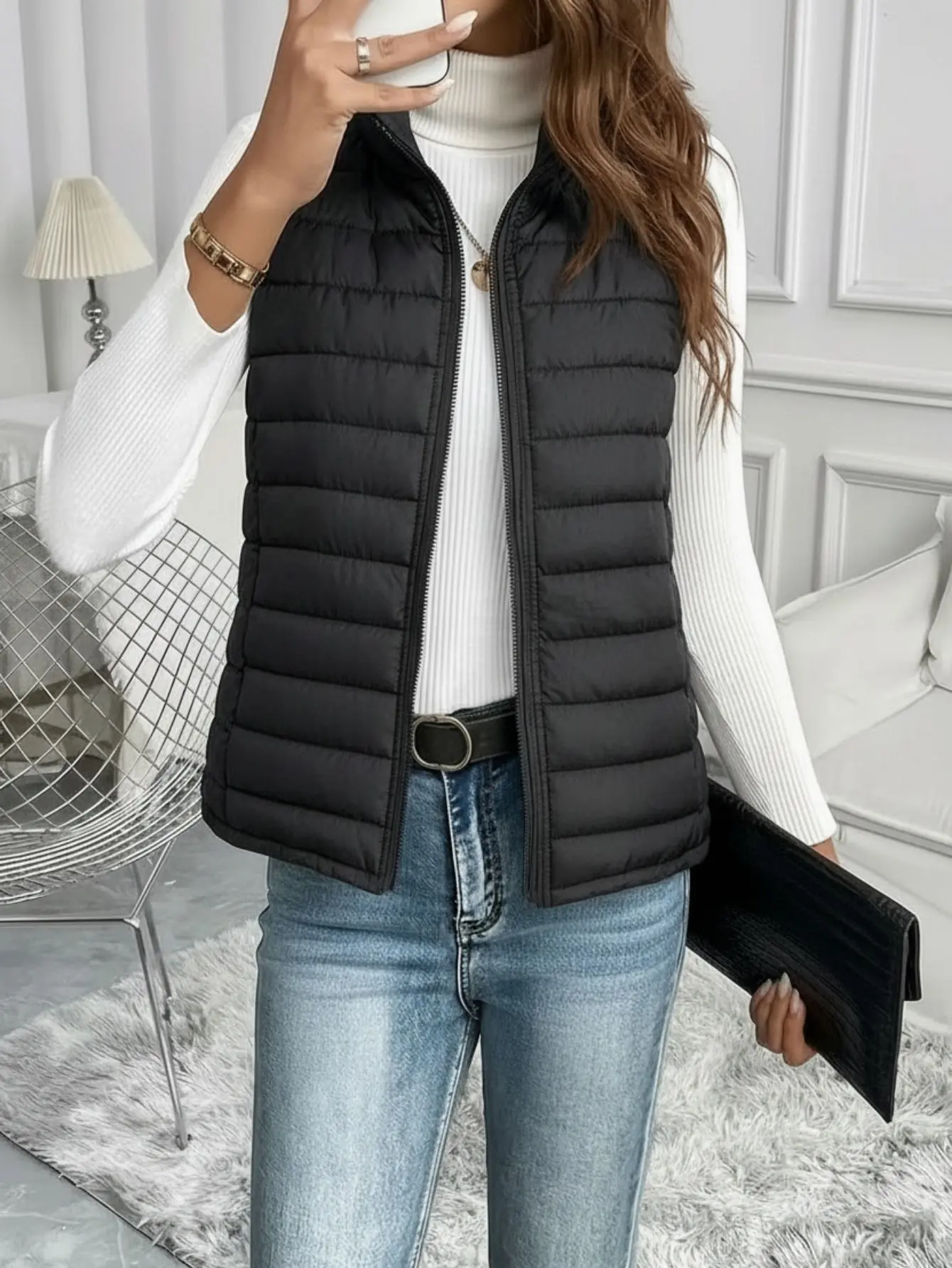 Women's lightweight vest with stand collar, zipper closure, sleeveless design with topstitching—casual, warm outerwear vest