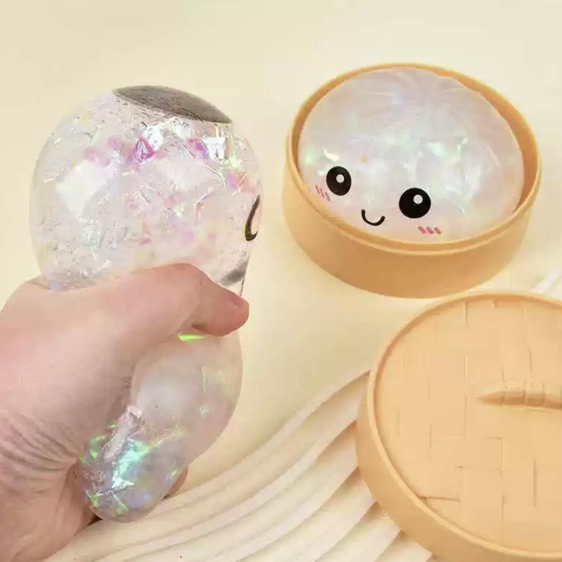 New Iridescent Smiling Face Glitter Dumpling Squishy with Steamer Box, Soft Sensory Fidget Toy, Cute Steamed Bun Squeeze Stress Relief Toy for Adults & Kids, Anxiety Relief & Calming Hand Toy, Made of Flexible & Durable TPR Material