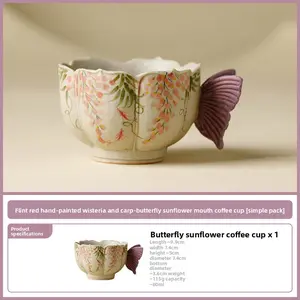 The hand-painted wisteria and carp pattern coffee cup, crafted by artisans, is an attractive and practical ceramic tea cup with a vintage style and vibrant colors