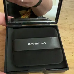 Product Review of CARSLAN Black Magnet Oil Blotting Setting Sheet With Powder More Control Oil Keep Fresh 2 IN 1 Blotting Sheet with Mirror Puff & Recyclable Case 450 Sheets 1 Box 2 Refills from N**r