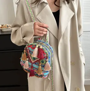 New lightweight women's backpack with ethnic style tassel crossbody bag, fashionable and versatile small backpack for travel.