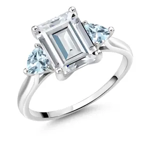 Gem Stone King 10K White Gold White Moissanite and Sky Blue Aquamarine 3-Stone Engagement Ring For Women | 2.93 Cttw | Emerald Cut 9X7MM | Three Stone Wedding Anniversary Promise Ring