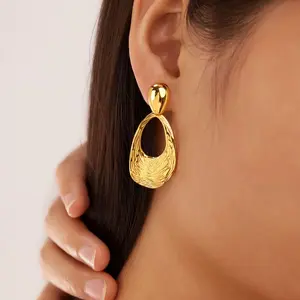 Resort‑Chic Gold Nautilus Shell Drops – Lightweight Statement Earrings