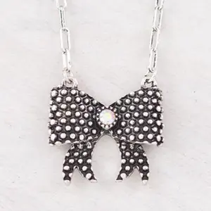 Bow Necklace Tooled Look with Center Gemstone and Silver Accents