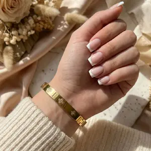 Clover Diamond Bracelet - Elegant Gold-Tone Bangle with Delicate Flower Design for Women