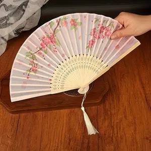 An elegant handheld flower folding fan with 25 fan ribs and decorative tassels, perfect for weddings, parties, gifts, wall decoration, outdoor photography, and as an ideal gift for Valentine's Day and Mother's Day.