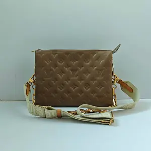 Pre-owned Louis Vuitton leather Clutches & Wristlets Coussin PM bag in taupe monogram embossed lambskin