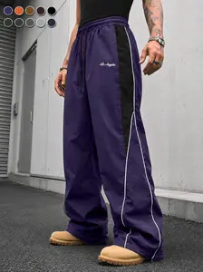Men's contrasting color reflective strip wide-leg casual pants, pendant smooth fabric, side stripes, American high street style, daily commuting adaptation, trendy and versatile personality
