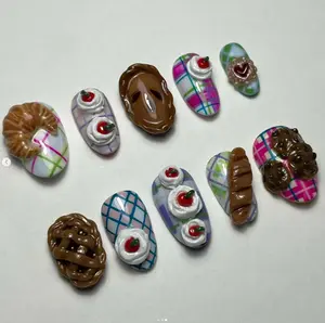 Bakery Nails with Plaid Backgrounds Cherry Tarts Cream Swirls and Croissants for a Cute Whimsical and Deliciously Playful Look