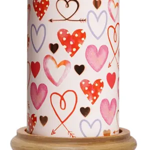 I Heart You Simmering Light Wax Warmer with Adorable Heart Design for Cozy Atmosphere comes with a white base and it comes with a random bag of sprinkles all sales are final