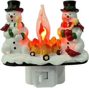 Christmas snowman bonfire with twinkling night lights, cute rotating plug-in doll-shaped lamps, suitable for holiday decoration and indoor use. Bonfire night lights with flashing bulbs, doll-shaped design